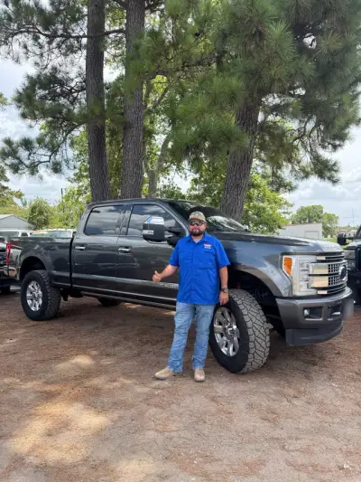 Happy GreenLight buyer with their vehicle